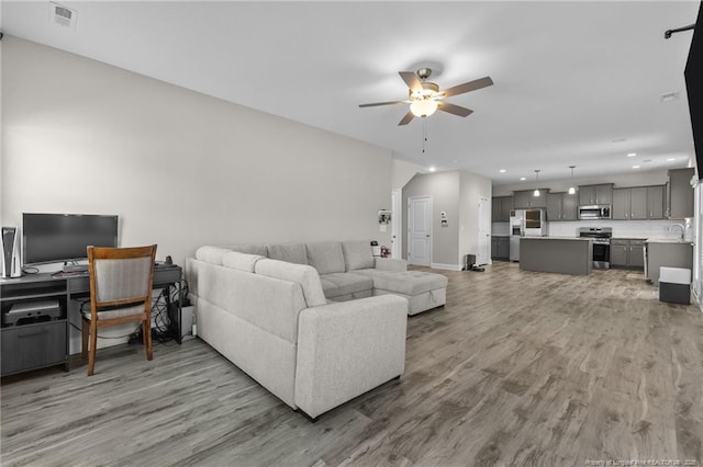 283 Leach Creek Dr, Raeford, NC 28376 - living area with a ceiling fan, light wood finished floors, and recessed lighting