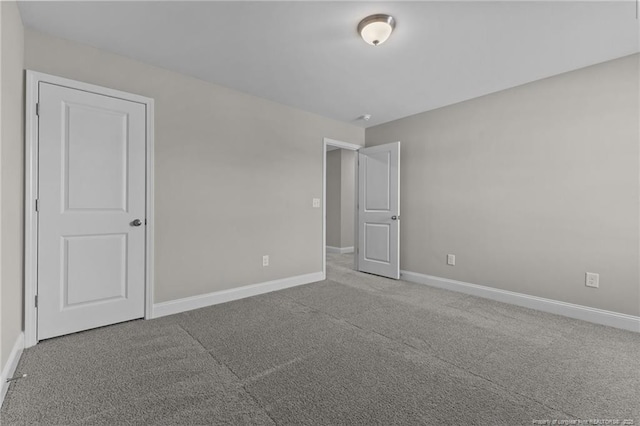 283 Leach Creek Dr, Raeford, NC 28376 - unfurnished bedroom with carpet and baseboards