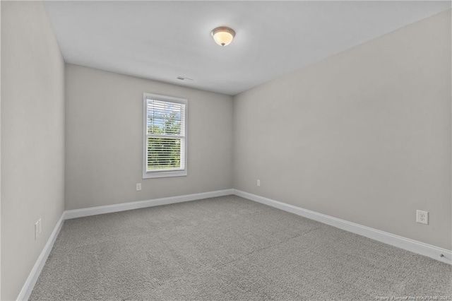 283 Leach Creek Dr, Raeford, NC 28376 - empty room with carpet floors and baseboards