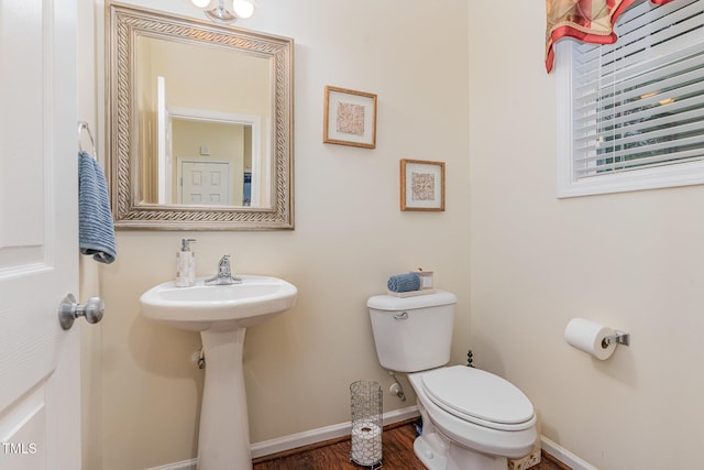 2810 Catamaunt, Durham, NC 27704 - bathroom with toilet and wood finished floors