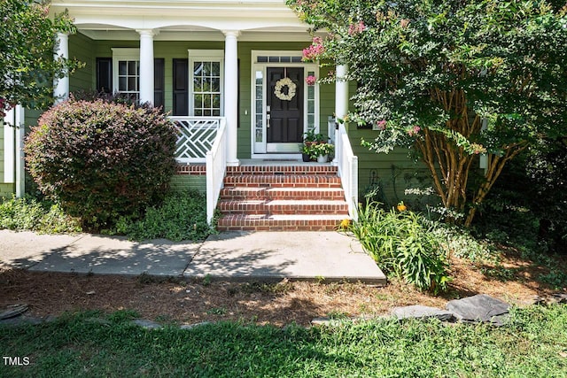 515 Wellingham Dr, Durham, NC 27713 - doorway to property with a porch