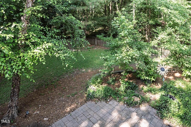 515 Wellingham Dr, Durham, NC 27713 - fenced backyard featuring a patio