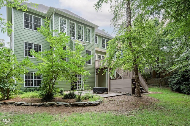 515 Wellingham Dr, Durham, NC 27713 - back of house featuring stairs and a patio