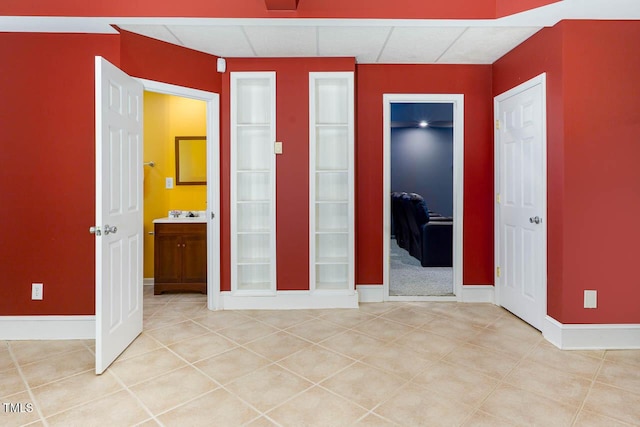 515 Wellingham Dr, Durham, NC 27713 - unfurnished bedroom with light tile patterned flooring and a closet