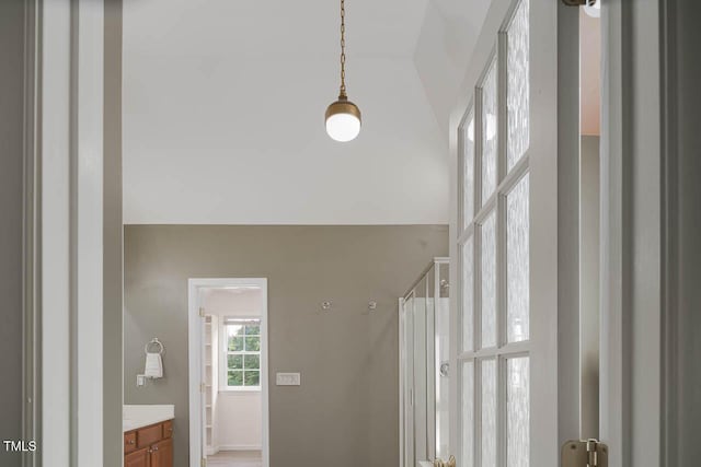515 Wellingham Dr, Durham, NC 27713 - bathroom featuring vanity, a shower stall, and vaulted ceiling