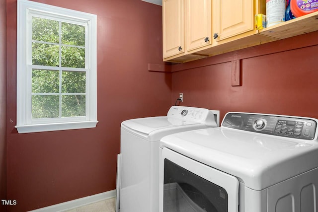 515 Wellingham Dr, Durham, NC 27713 - laundry area with cabinet space and independent washer and dryer