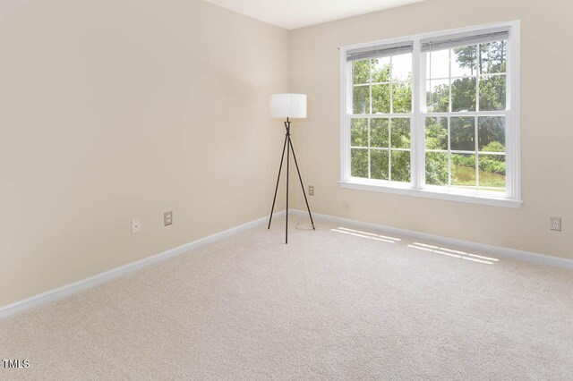 515 Wellingham Dr, Durham, NC 27713 - carpeted spare room featuring baseboards