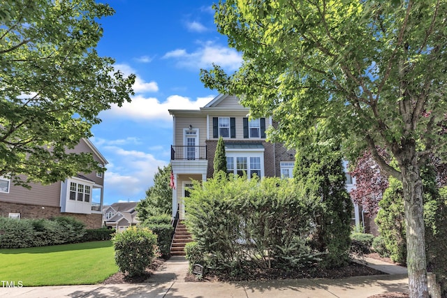 9216 Wooden Rd, Raleigh, NC 27617 - view of front of property featuring stairway and a front yard
