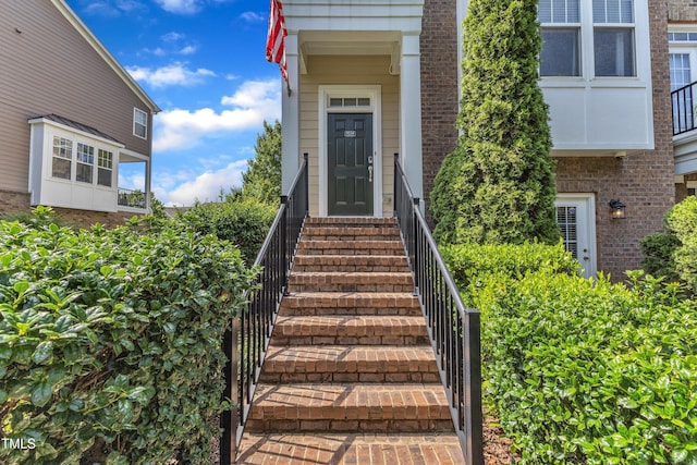 9216 Wooden Rd, Raleigh, NC 27617 - doorway to property featuring brick siding