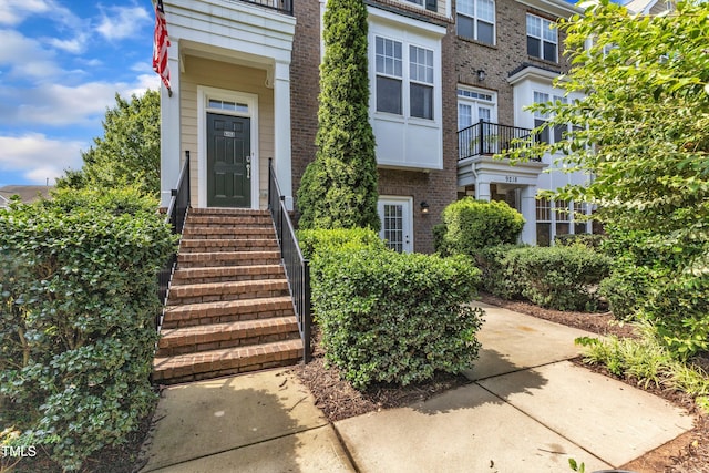 9216 Wooden Rd, Raleigh, NC 27617 - property entrance featuring brick siding