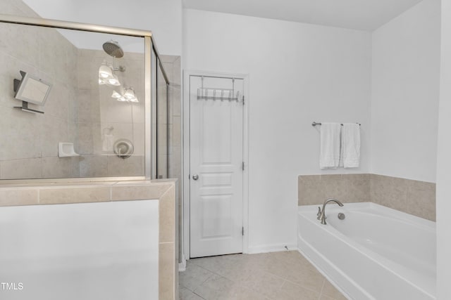 9216 Wooden Rd, Raleigh, NC 27617 - full bath featuring tile patterned flooring, a stall shower, and a bath
