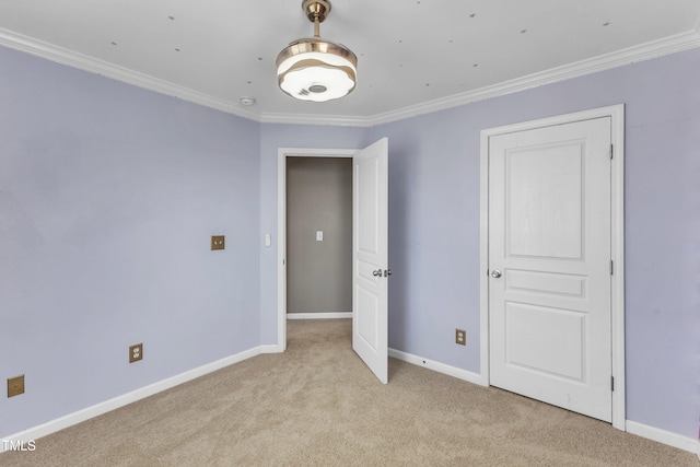9216 Wooden Rd, Raleigh, NC 27617 - unfurnished room with ornamental molding and light carpet