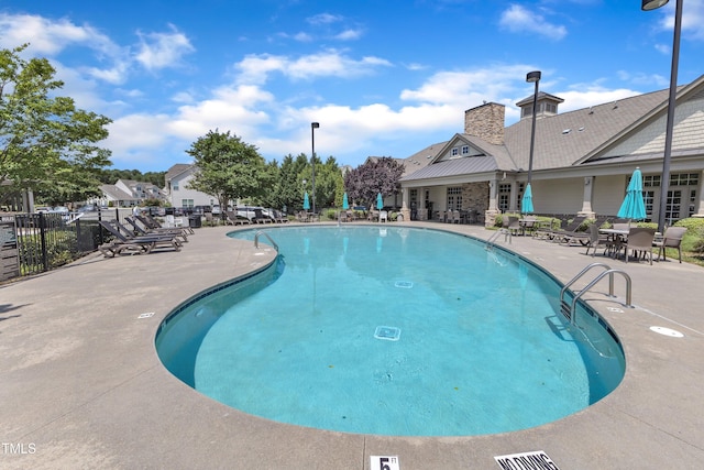9216 Wooden Rd, Raleigh, NC 27617 - community pool featuring a patio area