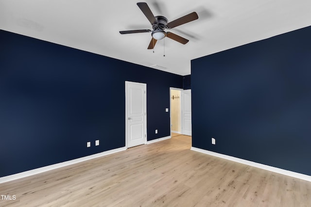 9216 Wooden Rd, Raleigh, NC 27617 - unfurnished room with wood finished floors and a ceiling fan