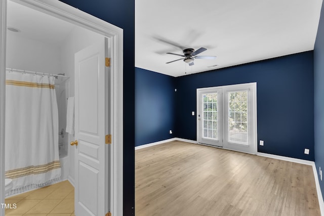 9216 Wooden Rd, Raleigh, NC 27617 - unfurnished room with a ceiling fan and wood finished floors