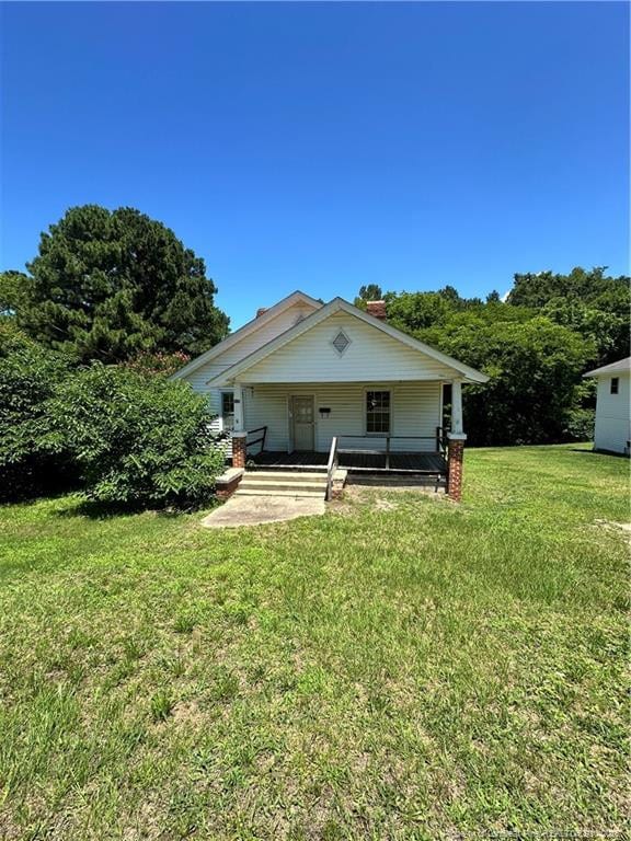 410 W K St, Erwin, NC 28339 - rear view of property with a porch and a yard