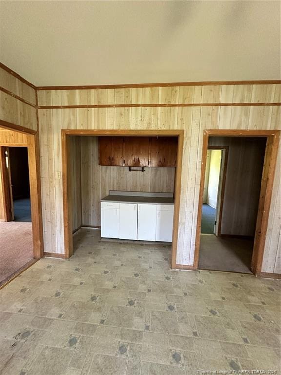 410 W K St, Erwin, NC 28339 - spare room with wooden walls