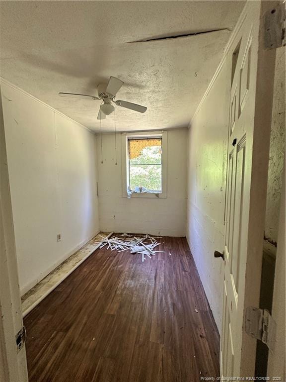 410 W K St, Erwin, NC 28339 - spare room featuring wood finished floors, a textured ceiling, and a ceiling fan
