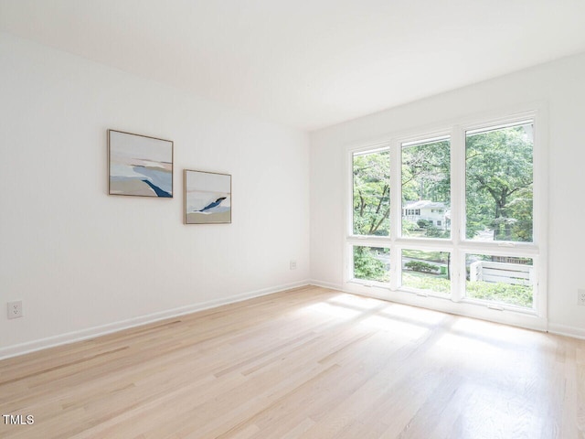 3205 Dell Dr, Raleigh, NC 27609 - unfurnished room featuring light wood-type flooring and baseboards