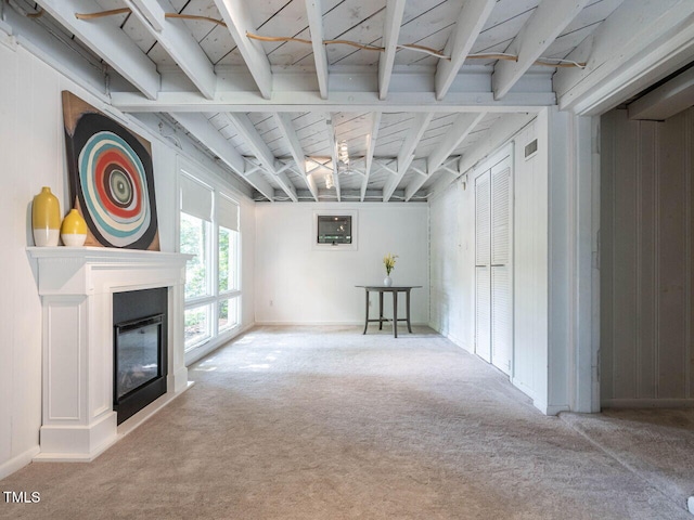 3205 Dell Dr, Raleigh, NC 27609 - unfurnished living room featuring carpet and a glass covered fireplace