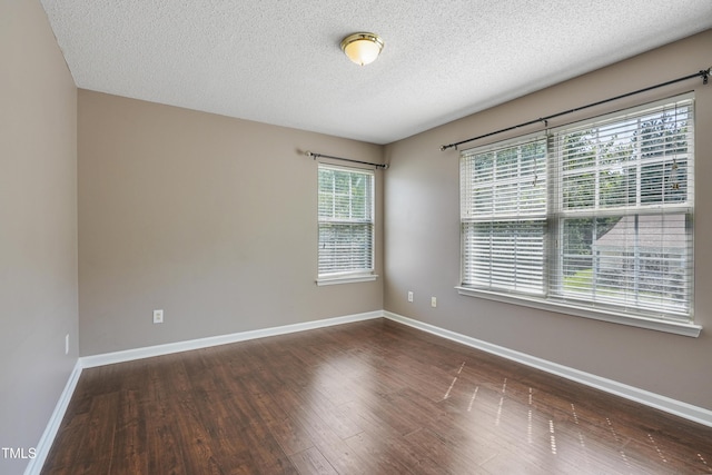 211 Cloverdale Dr, Durham, NC 27703 - unfurnished room featuring wood finished floors and a textured ceiling