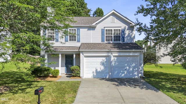 211 Cloverdale Dr, Durham, NC 27703 - traditional-style house featuring an attached garage, driveway, a front yard, and a shingled roof