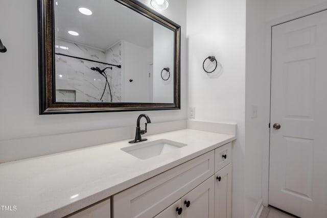 3129 Barwell Rd, Raleigh, NC 27610 - bathroom featuring vanity and a marble finish shower