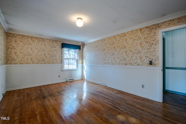 3129 Barwell Rd, Raleigh, NC 27610 - spare room featuring wallpapered walls, wainscoting, ornamental molding, and wood finished floors