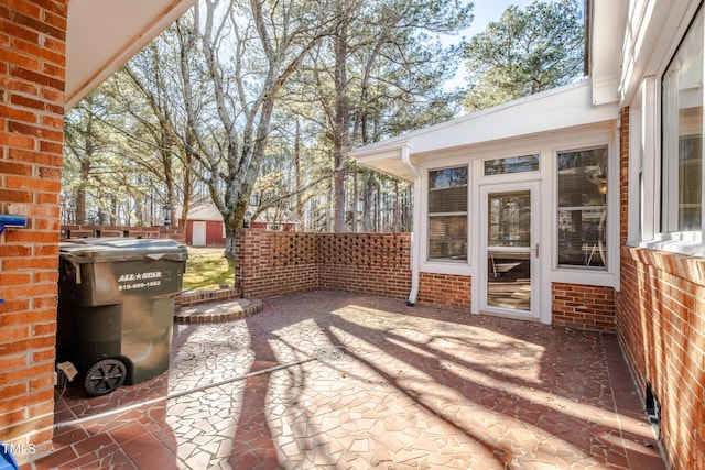 3129 Barwell Rd, Raleigh, NC 27610 - view of patio / terrace featuring a storage shed