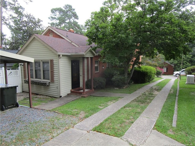 432 Rollingwood Cir, Fayetteville, NC 28305 - ranch-style home featuring roof with shingles and a front yard