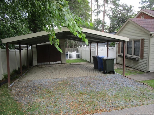 432 Rollingwood Cir, Fayetteville, NC 28305 - view of parking featuring a carport