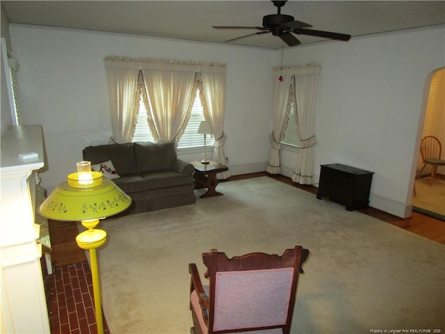 432 Rollingwood Cir, Fayetteville, NC 28305 - living room featuring a ceiling fan and baseboards