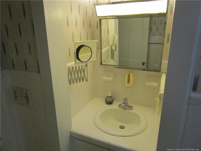 432 Rollingwood Cir, Fayetteville, NC 28305 - bathroom featuring decorative backsplash and vanity