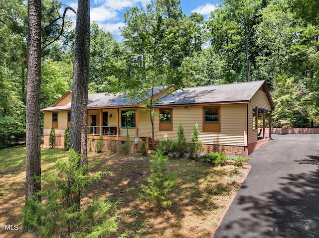 4134 King Charles Rd, Durham, NC 27707 - ranch-style home featuring a porch and crawl space