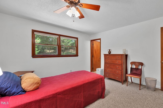 4134 King Charles Rd, Durham, NC 27707 - bedroom featuring a textured ceiling, light carpet, and ceiling fan