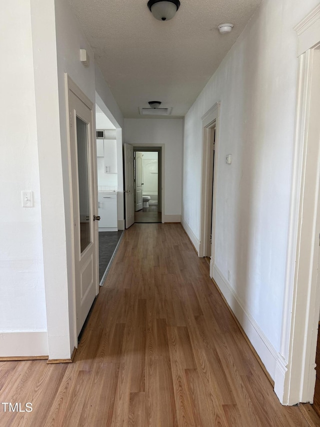 903 New Bern Ave, Raleigh, NC 27601 - corridor featuring light wood-style flooring and baseboards