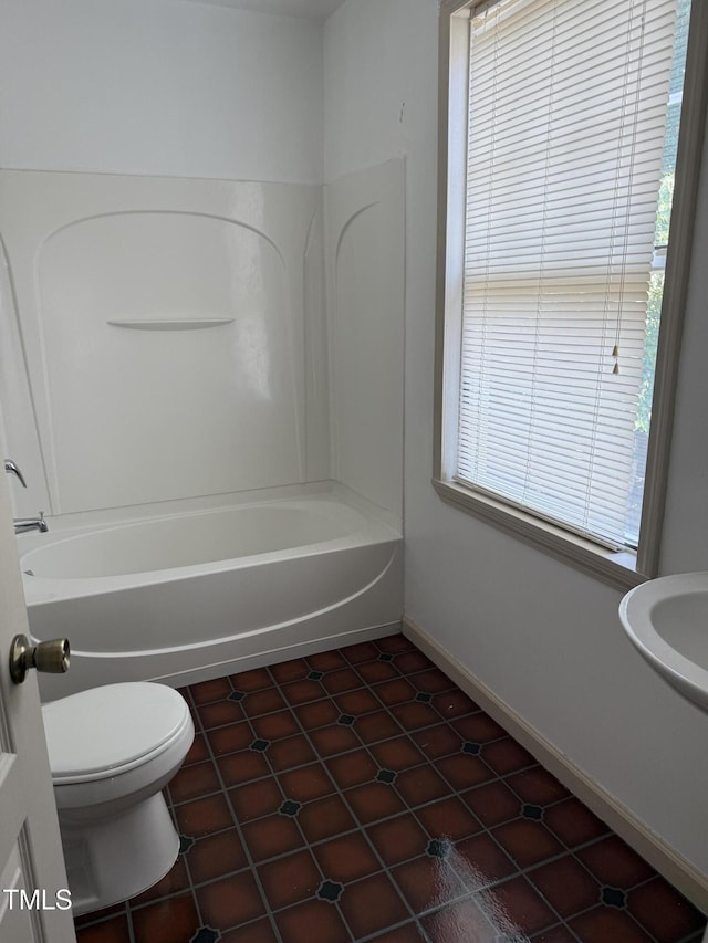 903 New Bern Ave, Raleigh, NC 27601 - full bathroom with tile patterned floors and bathtub / shower combination