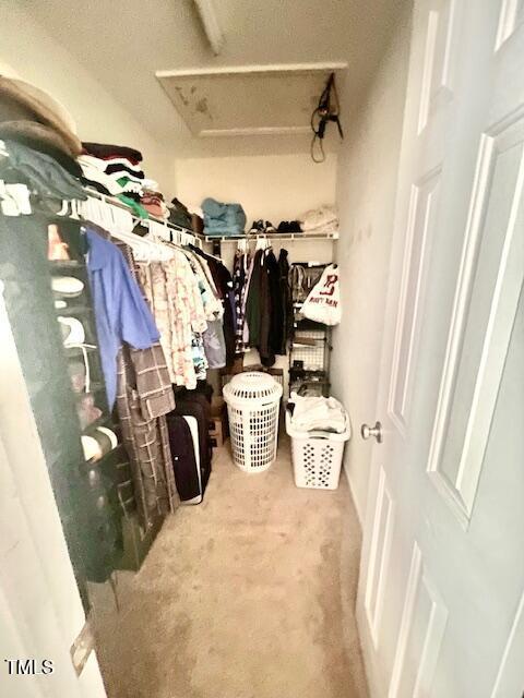 6328 Bermuda Way, Whitsett, NC 27377 - spacious closet featuring carpet flooring
