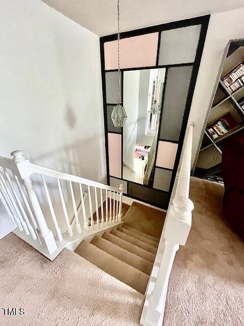 6328 Bermuda Way, Whitsett, NC 27377 - stairway with carpet flooring