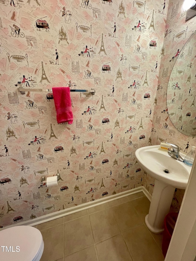 6328 Bermuda Way, Whitsett, NC 27377 - half bath with baseboards and tile patterned floors