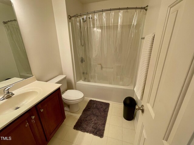 6328 Bermuda Way, Whitsett, NC 27377 - full bathroom featuring vanity, shower / bath combo with shower curtain, and tile patterned floors