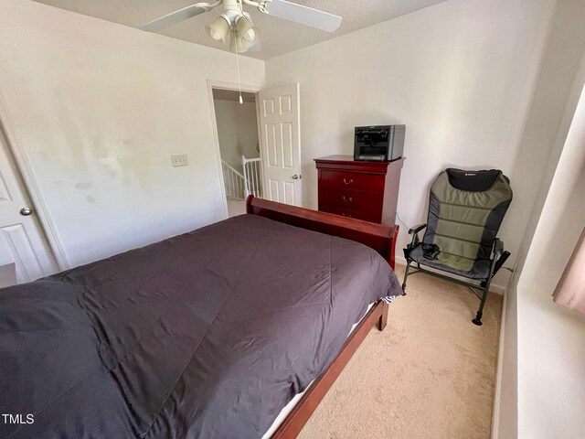 6328 Bermuda Way, Whitsett, NC 27377 - bedroom with carpet flooring and a ceiling fan