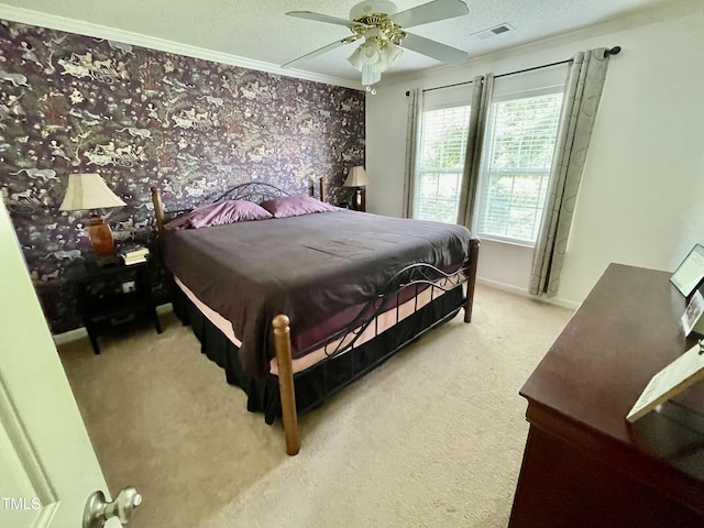 6328 Bermuda Way, Whitsett, NC 27377 - carpeted bedroom featuring a textured ceiling, crown molding, and ceiling fan