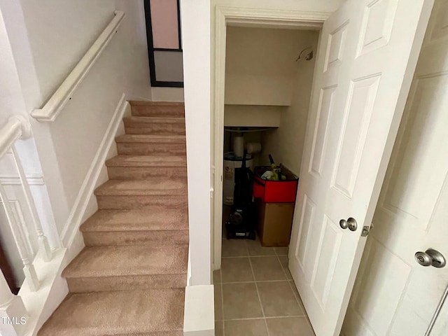 6328 Bermuda Way, Whitsett, NC 27377 - stairway featuring tile patterned flooring