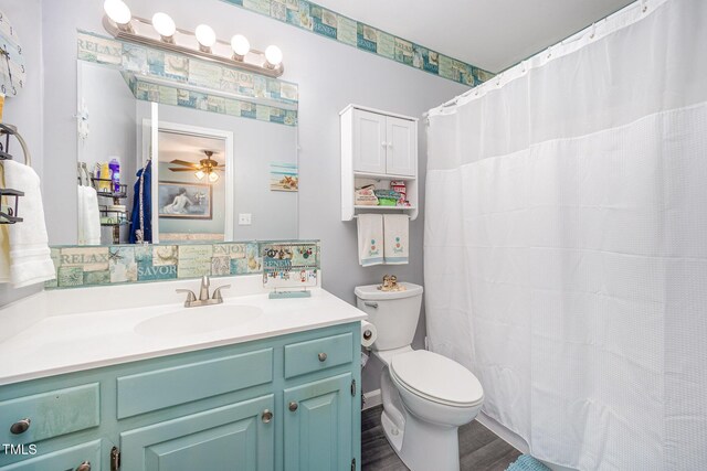 5538 Sharpe Dr, Raleigh, NC 27612 - bathroom featuring vanity, wood finished floors, a ceiling fan, and a shower with curtain