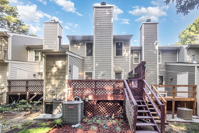 5538 Sharpe Dr, Raleigh, NC 27612 - rear view of property featuring a chimney and a deck