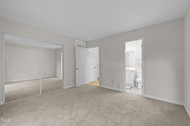 365 Summerwalk Cir, Chapel Hill, NC 27517 - unfurnished bedroom featuring carpet floors, a closet, and connected bathroom