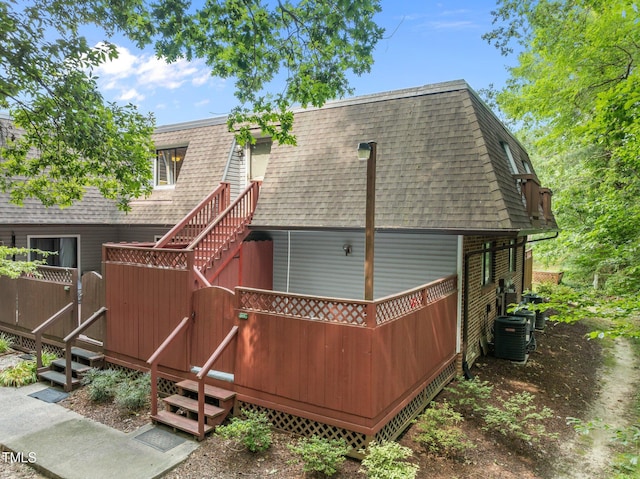 365 Summerwalk Cir, Chapel Hill, NC 27517 - back of house with a shingled roof, mansard roof, and stairway
