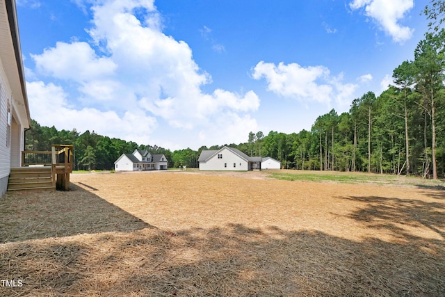 157 Cherrybirch Ln, Zebulon, NC 27597 - view of yard with a wooded view