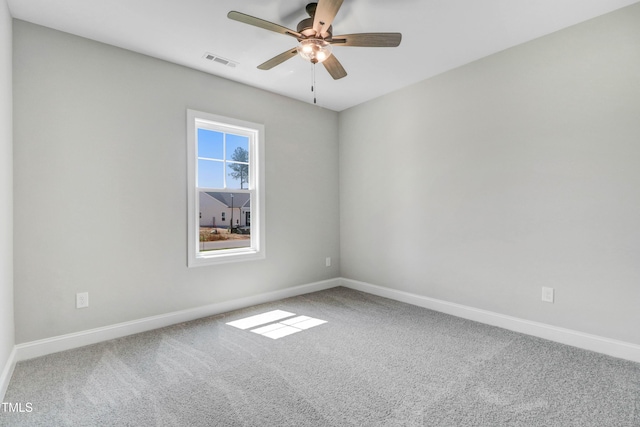 157 Cherrybirch Ln, Zebulon, NC 27597 - carpeted empty room with baseboards and a ceiling fan